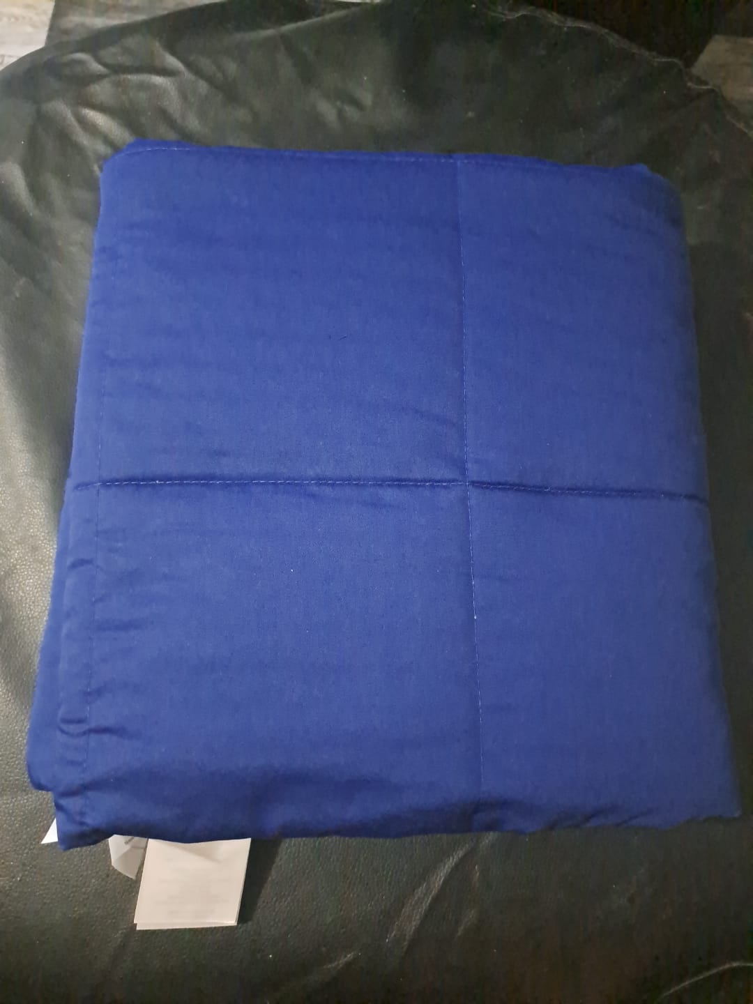 Gewichtsdecke mit Dino-Motiv