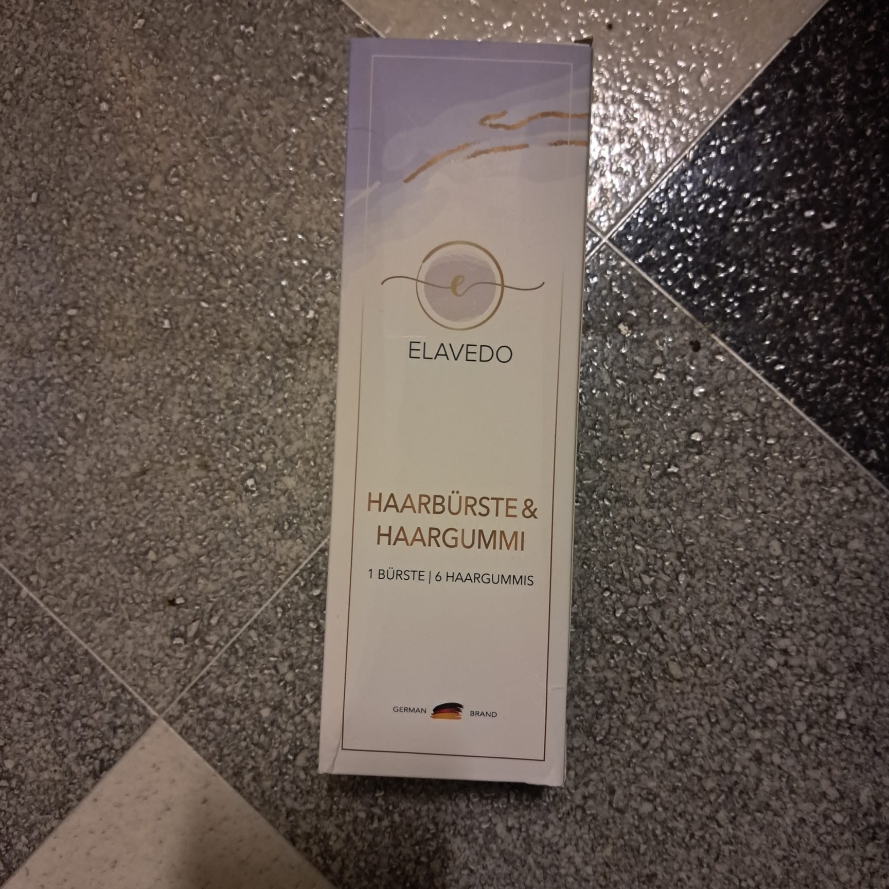 Elavedo Haarbürste und 6 Haargummis